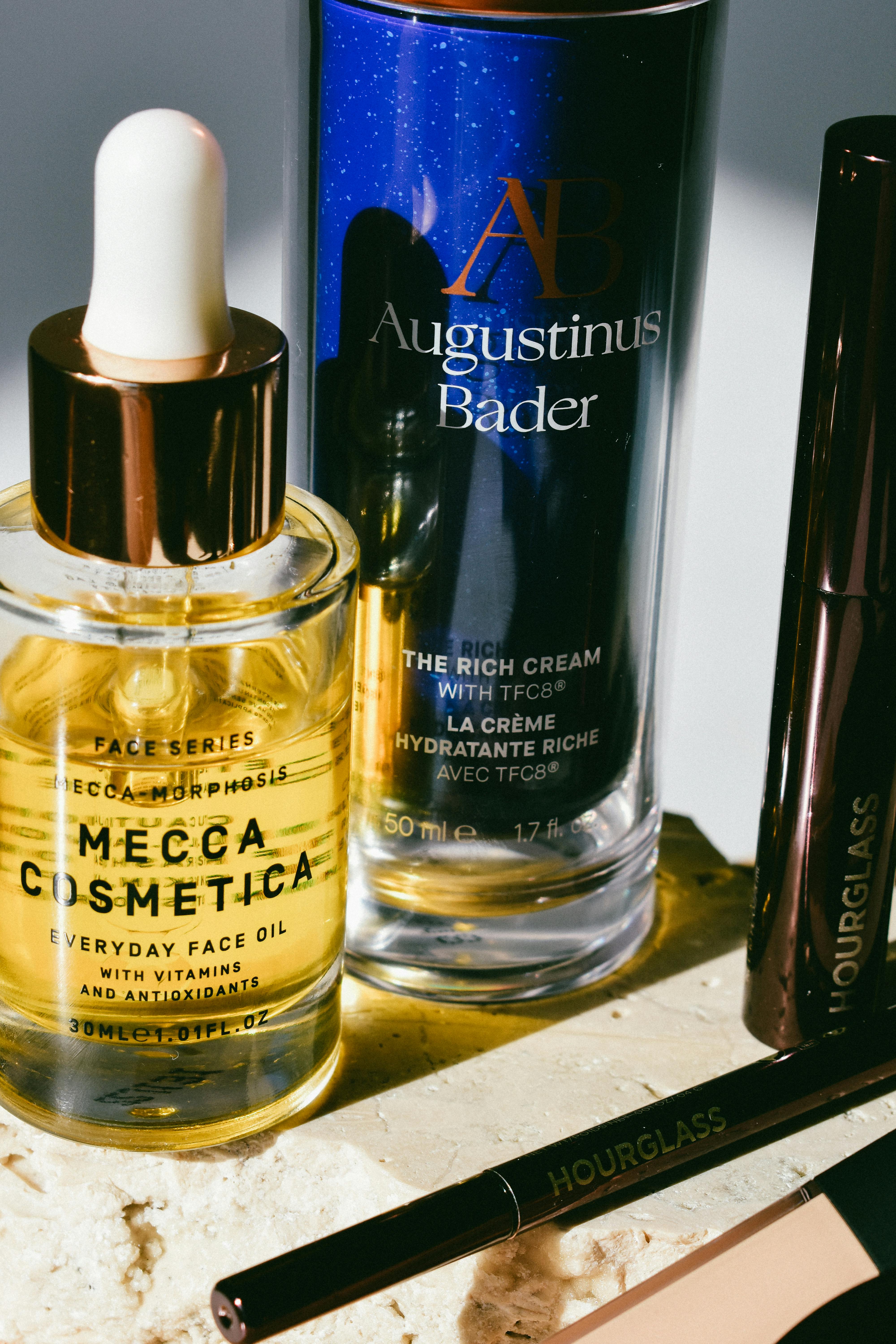 Close-up of luxury skincare and cosmetics products in natural light for beauty and wellness.